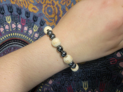 Happiness & Strength Hematite Karmalogy Bracelet